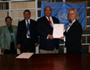 Ratification of the Convention on Prohibitions or Restrictions on the Use of Certain Conventional Weapons (with Protocols I, II, and III), United Nations Headquarters, New York: Mr. Zina Andrianarivelo-Razafy, Permanent Representative of the Republic of Madagascar (centre-right), ratifying the Convention.