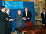 24 September 2003, Accession of Nicaragua to the Convention on the Recognition and Enforcement of Foreign Arbitral Awards: Mr. Enrique Bolanos Geyer (third from left), President of Nicaragua, depositing the instrument of accession; Mr. Hans Corell, Under-Secretary-General for Legal Affairs and Legal Counsel (second from right) and Mr. Palitha T. B. Kohona, Chief of the Treaty Section (far right)