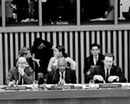24 February 1969 Second Session of the Committee on the Question of Defining Aggression, United Nations Headquarters, New York (from left to right): Mr. C.A. Stavropoulos, United Nations Legal Counsel; Mr. Fakhreddine Mohamed (Sudan), Chairman of the Committee; and Mr. A. Movchan, Committee Secretary. 