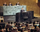 10 April 1974, Sixth special session of the General Assembly, United Nations Headquarters, New York (left to right at the podium): Mr. Houari Boumediene, President of the Revolutionary Council and of the Council of ministers of Algeria, addressing the Assembly; at the presidential rostrum (left to right): Secretary-General Kurt Waldheim; Mr. Leopoldo Benites (Ecuador), President of the Assembly; and Mr. Bradford Morse, Under-Secretary-General for Political and General Assembly Affairs.