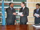15 December 2004, Accession to the Convention on Contracts for the International Sale of Goods, United Nations Headquarters, New York: Mr. Jean Ping (Gabon, left), Minister for Foreign Affairs and President of the Fifty-Ninth session of the General Assembly acceding to the Convention, among other instruments; standing next to him is Mr. Nicolas Michel, Under-Secretary-General for Legal Affairs and United Nations Legal Counsel and Mr. Palitha T.B. Kohona, Chief of the United Nations Treaty Section. 
