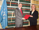 United Nations Headquarters, New York: Mr. Juan Antonio Yáñez-Barnuevo, Permanent Representative of Spain (left) giving consent to be bound by the Protocol on Explosive Remnants of War (Protocol V); standing next to him is Ms. Annebeth Rosenboom, Chief of the United Nations Treaty Section.