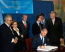 25 September 2003 - Ratification of the Convention on the Prohibition of the Use, Stockpiling, Production, Transfer of Anti-Personnel Mines and on Their Destruction, United Nations Headquarters, New York: Mr. George A. Papandreou (seated), Minister for Foreign Affairs of Greece, ratifying the Convention.