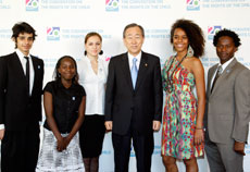 20 November 2009. The Secretary-General meeting youth at Convention on the Rights of the Child event, United Nations, New York. Secretary-General Ban Ki-moon (third from right) posing for a group photo with youth delegates at the United Nations Children's Fund (UNICEF)'s 20th Anniversary Commemoration of the Convention on the Rights of the Child. With them is former child soldier and UNICEF Goodwill Ambassador Ishmael Beah (right).