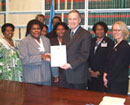 17 May 2007. Signing of the Convention on the Rights of Persons with Disabilities, United Nations Headquarters, New York. Mrs. Isabelle Donald Sikawonuta, Minister for Social Welfare and Justice of Vanuatu (second from left), signing the Convention. 