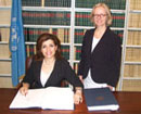 14 June 2007. Signing of the Convention on the Rights of Persons with Disabilities, United Nations Headquarters, New York. Ms. Caroline Ziade, Chargé d'Affaires, Deputy Permanent Representative of Lebanon (left), signing the Convention. To the right, Ms. Annebeth Rosenboom, Chief of the Treaty Section, United Nations Office of Legal Affairs.