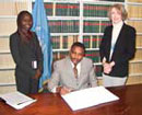 12 January 2007, Signing of the Optional Protocol to the Convention on the Safety of United Nations and Associated Personnel, United Nations Headquarters, New York: Mr. Muburi-Muita (Kenya), signing the Protocol.