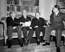 25 April-26 June 1945 - San Francisco Conference, informal meeting at Mr. Stettinius’ apartment in the Fairmont Hotel, San Francisco (from left to right): Mr. Anthony Eden, United Kingdom; Mr. E.R. Stettinius Jr. (United States of America); Mr. V.M. Molotov (USSR); and Mr. T. V. Soong (China).