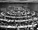 8 October 1986 Forty-first Session of the General Assembly, Fourth Committee Trust and Non-Self-Governing Territories), United Nations Headquarters, New York (on the podium, from left to right): Mr. Najmuddine Rifai, Assistant Secretary-General for Political Affairs, Trusteeship and Decolonization; Mr. James Victor Gbeho, Chairman of the Committee; and Mr. Thomas Tanaka, Committee Secretary