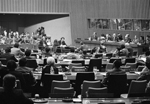 25 October 1976 - First Committee of the General Assembly, United Nations, New York. The First Committee of the General Assembly discussing the item proposed by the Soviet Union: “Conclusion of a world treaty on the non-use of force in international relations”. Henryk Jaroszek (Poland), Chairman of the Committee, addressing the meeting. At the table from left: Arkady N. Shevchenko, Under-Secretary-General for Political and Security Council Affairs; Mr Jaroszek; Purnendu K. Banerjee, Committee Secretary; and Kedar Bhakta Shrestha (Nepal), Rapporteur. (Photo Credit: UN Photo/Yutaka Nagata)