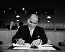 20 December 1966 - Twenty-first Session of the General Assembly, United Nations Headquarters, New York: Ambassador Salvador P. Lopez (Philippines) signing the International Covenant on Civil and Political Rights and the International Covenant on Economic, Social and Cultural Rights.