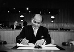 21 October 1958 - Signing ceremony of the International Covenant on Civil and Political Rights and the International Covenant on Economic, Social and Cultural Rights, United Nations Headquarters, New York: Ambassador Salvador P. Lopez (Philippines) signing the Covenants.