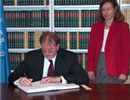 7 December 2005, Signing of the International Convention for the Suppression of Acts of Nuclear Terrorism, United Nations Headquarters, New York: Mr. Milos Prica (Bosnia and Herzegovina), signing the Convention. 