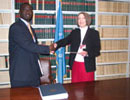6 March 2006, Signing of the International Convention for the Suppression of Acts of Nuclear Terrorism, United Nations Headquarters, New York: Mr. Stanislas Kamanzi (Rwanda), on the left, after having signed the Convention. 