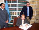 26 December 2006, Signing of the International Convention for the Suppression of Acts of Nuclear Terrorism, United Nations Headquarters, New York: Mr. Abdullatif H. Sallam (Saudi Arabia), signing the Convention. 