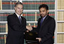 20 January 2003, Ratification of the International Convention for the Suppression of the Financing of Terrorism, United Nations Headquarters, New York: Mr. Luis Ernesto Derbez (left), Minister for Foreign Affairs of Mexico, depositing the instruments of ratification of the Convention, among other instruments; standing next to him is Mr. Palitha T.B. Kohona, Chief of the United Nations Treaty Section.