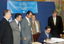 24 September 2003, Accession to the International Convention for the Suppression of the Financing of Terrorism, United Nations Headquarters, New York: Mr. Abdullah Abdullah (seated), Minister for Foreign Affairs of Afghanistan, acceding to the Convention, among other instruments.