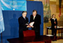 26 September 2003, Ratification of the International Convention for the Suppression of the Financing of Terrorism, United Nations Headquarters, New York: Wlodzimierz Cimoszewicz (left), Minister for Foreign Affairs of the Republic of Poland, ratifying the Convention, among other instruments.