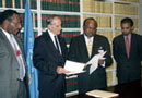30 September 2003, Accession to the International Convention for the Suppression of the Financing of Terrorism, United Nations Headquarters, New York: Mr. Rabbie L. Namaliu (second from right), Minister for Foreign Affairs of Papua New Guinea, acceding to the Convention, among other instruments.