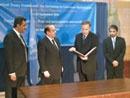 21 September 2004, Ratification of the International Convention for the Suppression of the Financing of Terrorism, United Nations Headquarters, New York: Shaikh Mohammed bin Mubarak Al-Khalifa (second from left), Minister for Foreign Affairs of the Kingdom of Bahrain, depositing the instruments of ratification of Convention; standing at his left is Mr. Nicolas Michel, Under-Secretary-General for Legal Affairs and United Nations Legal Counsel.
