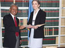29 June 2006, Ratification of the International Convention for the Suppression of the Financing of Terrorism, United Nations Headquarters, New York: Mr. Slamet Hidayat, Director-General for Multilateral Affairs of the Department of Foreign Affairs of the Republic of Indonesia, ratifying the Convention; standing next to him is Ms. Barbara Masciangelo, United Nations Treaty Section.