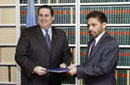 17 January 2003, Accession to the International Convention for the Suppression of Terrorist Bombings, United Nations Headquarters, New York: Mr. Eduardo J. Sevilla Somoza (left), Permanent Representative of Nicaragua to the United Nations, acceding to the Convention; standing next to him is Mr. Palitha T.B. Kohona, Chief of the United Nations Treaty Section.