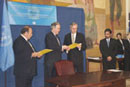 23 September 2003, Ratification of the International Convention for the Suppression of Terrorist Bombings, United Nations Headquarters, New York: Mr. Roy Chaderton-Matos (second from left), Minister for Foreign Affairs of Venezuela, ratifying the Convention, among other instruments; standing at his left is Mr. Hans Corell, Under-Secretary-General for Legal Affairs and United Nations Legal Counsel.