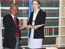 29 June 2006, Accession to the International Convention for the Suppression of Terrorist Bombings, United Nations Headquarters, New York: Mr. Slamet Hidayat (left), Director-General for Multilateral Affairs of the Department of Foreign Affairs of the Republic of Indonesia, acceding to the Convention; standing next to him is Ms. Barbara Masciangelo, United Nations Treaty Section.