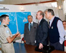 26 July 1994, Visit of the Under-Secretary General for Humanitarian Affairs to Kigali, Rwanda: Major-General Romeo Dallaire (left), Force Commander of the United Nations Assistance Mission in Rwanda (UNAMIR), briefing Mr. Shahryar M. Khan (second from left), Special Representative of the Secretary-General, and Mr. Peter Hansen (third from left), Emergency Relief Coordinator and Under-Secretary-General for Humanitarian Affairs. 