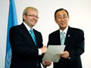 12 December 2007 Ratification of the Kyoto Protocol, Bali, Indonesia: Mr. Kevin Rudd (left), Prime Minister of Australia, handing over the instrument of ratification to Secretary-General Ban Ki-moon.