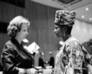 6 December 1966 Twenty-first Session of the General Assembly, meeting of the Third Committee on the Report of the High Commissioner for Refugees, United Nations Headquarters, New York: Mrs. Gertruda Sekaninova-Cakrtova (Czechoslovakia) (left) and Mrs. Tiguidank Soumah (Guinea). 
