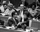 6 December 1966 Twenty-first Session of the General Assembly, meeting of the Third Committee on the Report of the High Commissioner for Refugees, United Nations Headquarters, New York: Mr. K. P. Saksena (India) (left in the foreground) and Mrs. L. Ider (Mongolia). 
