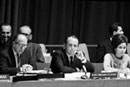 6 December 1966 Twenty-first Session of the General Assembly, meeting of the Third Committee on the Report of the High Commissioner for Refugees, United Nations Headquarters, New York (from left to right): Mr. Constantin A. Stavropoulos, United Nations Legal Counsel, addressing the Committee; Prince Sadruddin Aga Khan, United Nations High Commissioner for Refugees; and Mrs. Halima Enbarek Warzazi (Morocco), Chairman of the Committee. 