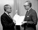 28 November 1967 Accession of Norway to the Protocol relating to the Status of Refugees, United Nations Headquarters, New York: Ambassador Edward Hambro (right), Permanent Representative of Norway, depositing the instrument of accession with Secretary-General U Thant. 