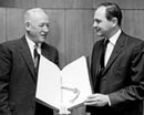 6 November 1968 Accession of Ireland to the Protocol relating to the Status of Refugees, United Nations Headquarters, New York: Ambassador Cornelius C. Cremin (left), Permanent Representative of Ireland to the United Nations, depositing the instrument of accession with Mr. F. Blaine Sloan, Director of the United Nations General Legal Division. 