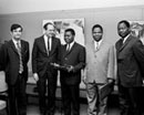 9 July 1970 Accession of the People's Republic of the Congo to the Protocol relating to the Status of Refugees, United Nations Headquarters, New York (from left to right): Mr. Jacques Roman, Legal Officer of the United Nations Legal Affairs; Mr. F. Blaine Sloan, Director of the General Legal Division of the United Nations Legal Affairs; Mr. Nicolas Mondjo, Permanent Representative of People's Republic of the Congo to United Nations; Mr. Jean Mombouli, Senior Counselor; and Mr. Philippe Gouamba, Secretary of Embassy. 
