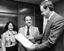 5 May 1980 Accession of Bolivia to the Convention and Protocol relating to the Status of Refugees, United Nations Headquarters, New York: Mr. Sergio Palacios de Vizzio (center), Bolivia's Permanent Representative to the United Nations and Ms. Dora Susana Suarez Dominguez, Second Secretary of the Bolivian Mission to the United Nations, depositing the instruments of accession with Mr. Erik Suy, Under-Secretary-General for Legal Affairs and Legal Counsel of the United Nations. 