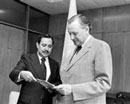 28 April 1983 Accession of El Salvador to the Convention and Protocol relating to the Status of Refugees, United Nations Headquarters, New York: United Nations Ambassador Mauricio Rosales-Rivera of El Salvador (left), depositing the instrument of accession with Mr. Carl-August Fleischhauer, United Nations Legal Counsel.