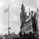 1 May 1962 - International Court of Justice, Peace Palace, The Hague, Netherlands: view of the Palace with the United Nations flag. (Photo credit: UN Photo)