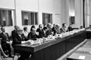 27 May 1974, Special meeting of the International Law Commission to commemorate the Twenty-Fifth Anniversary of the opening of its First Session, Palais des Nations, Geneva: Mr. Endre Ustor (centre), Chairman of the current session of the Commission; seated next to him are Mr. V. Winspeare Guicciardi (left), Director General of the United Nations Office at Geneva, and Mr. Erik Suy (right), United Nations Legal Counsel.