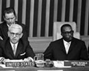 17 December 1966 First Committee, United Nations Headquarters, New York: Mr. E.E. Seaton (United Republic of Tanzania) (right) and Mr. Arthur J. Goldberg (United States of America) addressing the Comittee on the Draft Treaty on Exploration and Uses of Outer Space. 