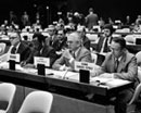 24 March 1975 Third Session of the Third United Nations Conference on the Law of the Sea, meeting of the Second Committee, Geneva, Switzerland: Mr. Lothat Moeckel (German Democratic Republic) (right) and, at his right, Mr. Wilhelm H. Lampe (Federal Republic of Germany). 
