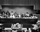 24 September 1982 Resumed Eleventh Session of the Third United Nations Conference on the Law of the Sea, three-days session to prepare the final text of the Convention on the Law of the Sea adopted in April, United Nations Headquarters, New York (from left to right): Mr. Bernardo Zueeta, Under-Secretary-General, UN Conference on the Law of the Sea; Mr. Paul Engo Bambla (Cameroon), Chairman of the Committee; Mr. T.T.B. Koh (Singapore), President; Mr. John A. Beesley (Canada), Chairman of the Drafting Committee; Mr. Dolliver Nelson, Secretary; and Mr. N. Terazaki, Committee Assistant. 