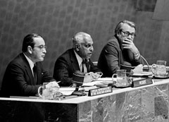 3 March 1980, At the Presidential rostrum (from left to right): Mr. Bernardo Zuleta, Special Representative of the Secretary-General to the Conference; Mr. H. Shirley Amerasinghe, President of the Conference; and Mr. David L. D. Hall, Executive Secretary of the Conference.