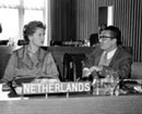 9 November 1961, Sixteenth Session of the General Assembly, meeting of the Sixth Committee, United Nations Headquarters, New York (from left to right): Mrs. A. P. Schilthuis (the Netherlands), and Mr. Ramanand Sinha, Government Advocate (Nepal). 
