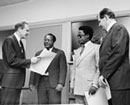 31 May 1974, United Nations Headquarters, New York (from left to right): Mr. F. Blaine Sloan, Director of the General Legal Division, United Nations Office of Legal Affairs, receiving the Instrument of Accession from Ambassador Callixte Habamenshi, Permanent Representative of Rwanda to the United Nations; Mr. E. Munyanshongore, Second Secretary of Rwanda; and Mr. P. Giblain, Chief of the Treaty Section, United Nations Office of Legal Affairs.