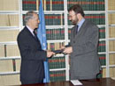 05 April 2004, United Nations Headquarters, New York: Mr. Juli Minoves-Triquell (right), Minister for Foreign Affairs of the Principality of Andorra, depositing the Instruments of Accession to the Vienna Convention on the Law of Treaties.