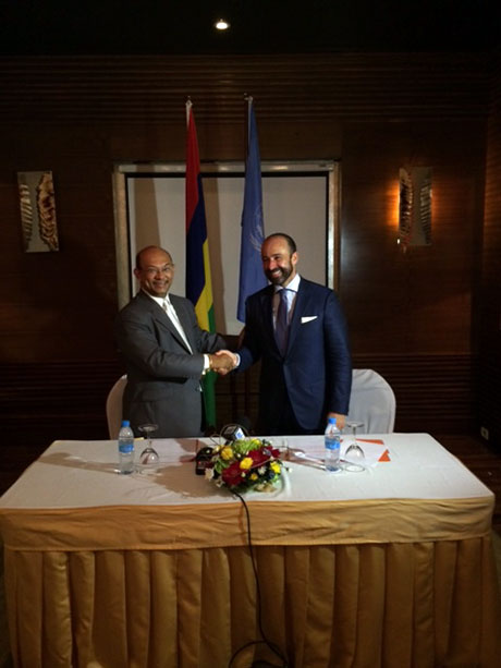The Legal Counsel, Mr. Serpa Soares, and the Minister of Foreign Affairs of the Republic of Mauritius, Mr. Etienne Sinatambou, at a press conference following the signing ceremony.