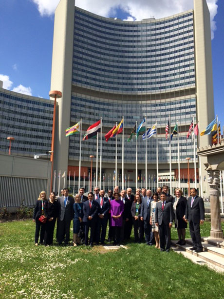 UNIDO Director-General LI Yong joins the United Nations Legal Counsel, Mr. Serpa Soares, and the Members of the network of Legal Advisers of the UN System for a group photo at the Vienna International Centre
