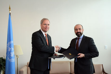 Mr. Miguel de Serpa Soares, and H.E. Mr. Karel van Oosterom signed the agreement.